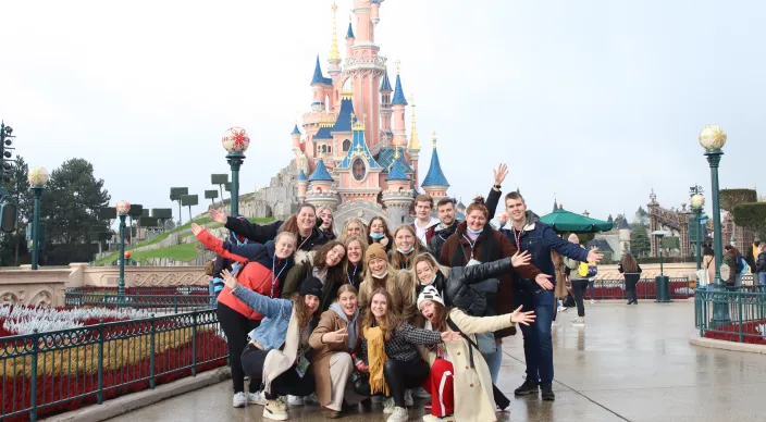 students standing in front of disney